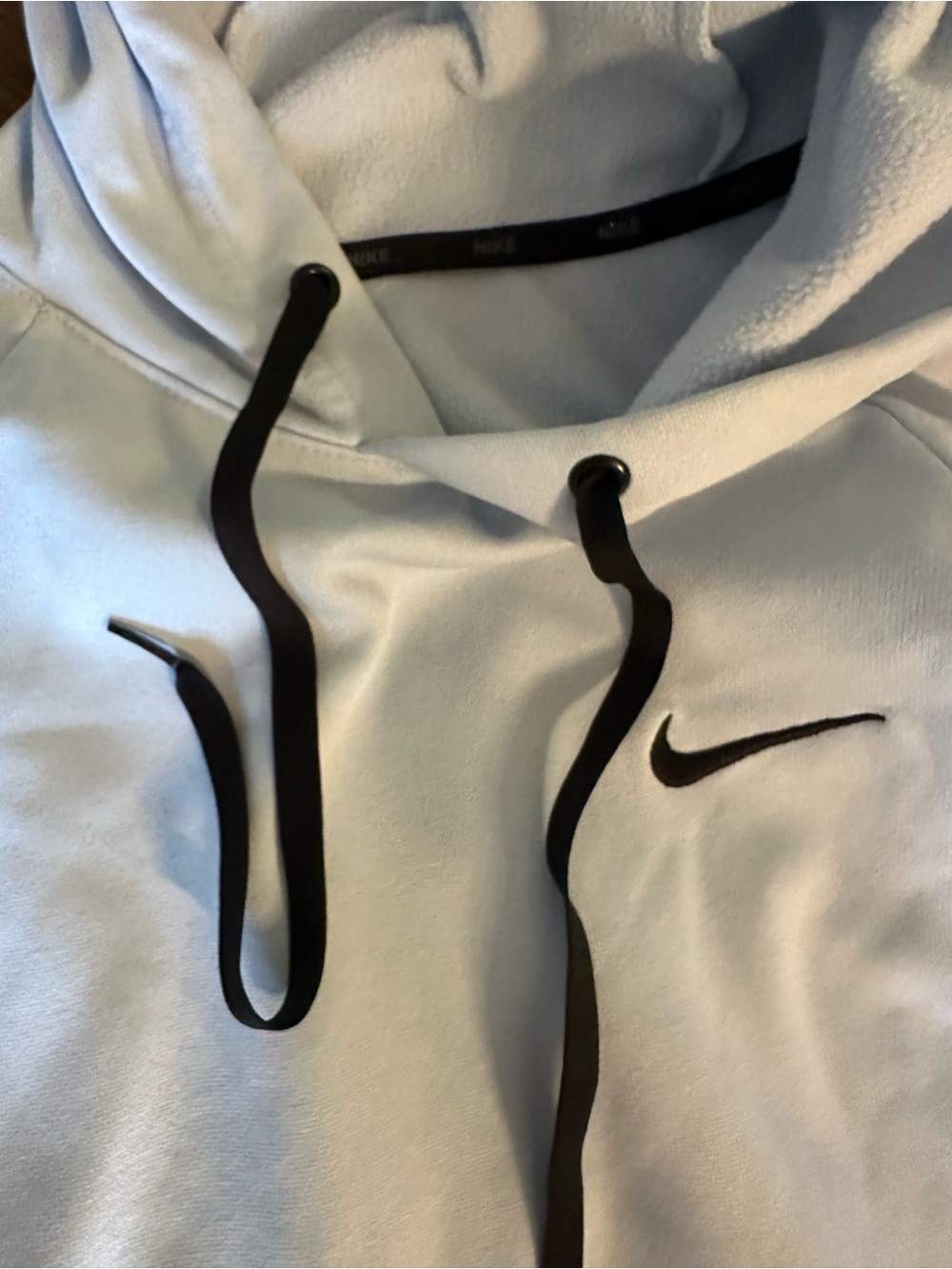 Nike Light Blue Hoodie with Black Swoosh and Drawstrings